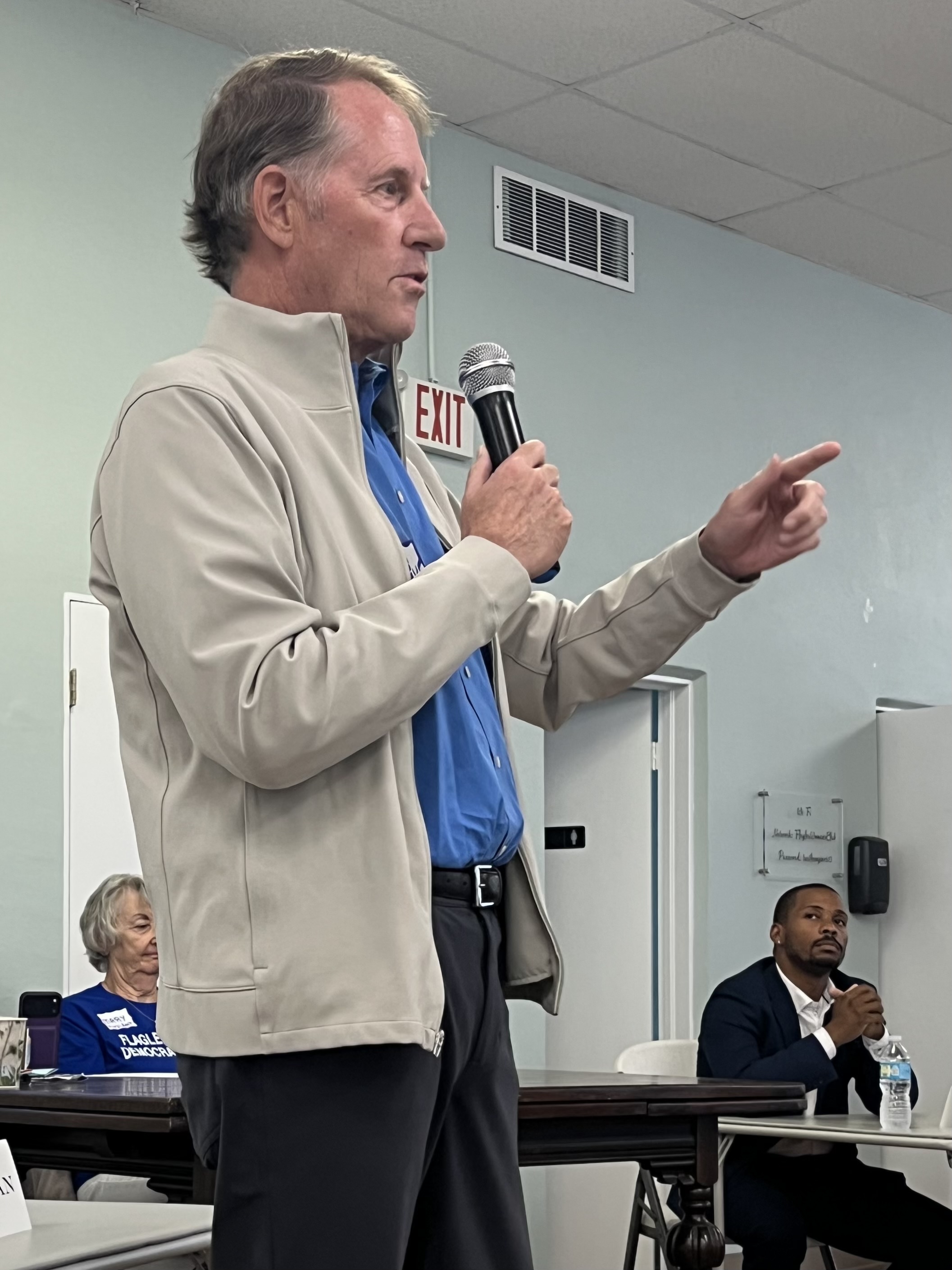 Steve Morgan speaking to voters at a community event